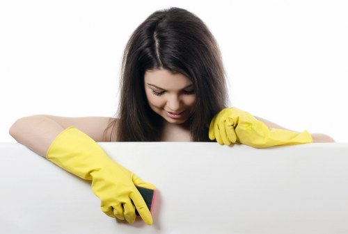 Professional domestic cleaner preparing a Belgravia home interior